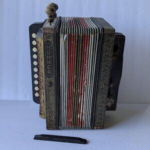 Antique M Hohner Button Accordion. There are imperfections